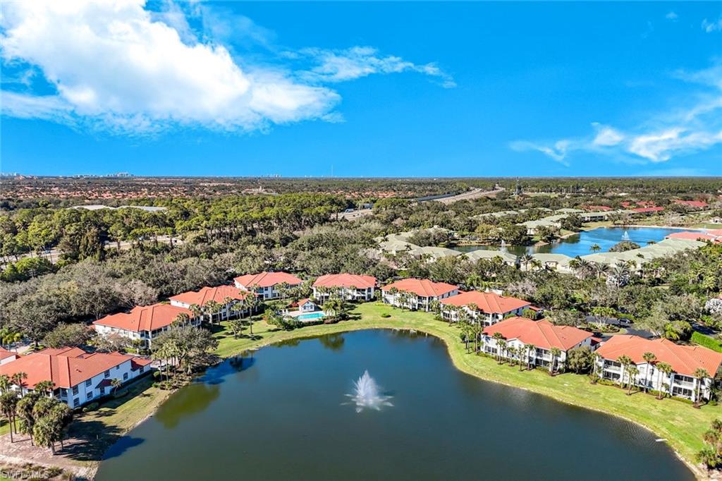 Aerial view of residential area with a nearby body of water