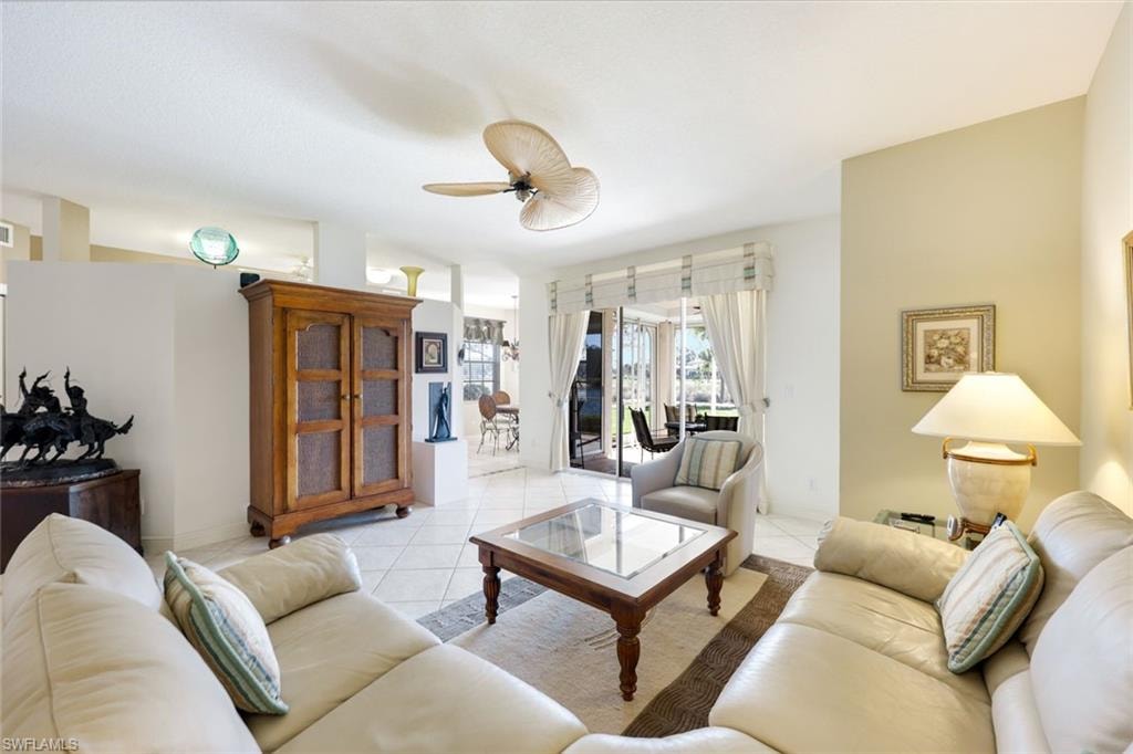 Tiled living room with ceiling fan