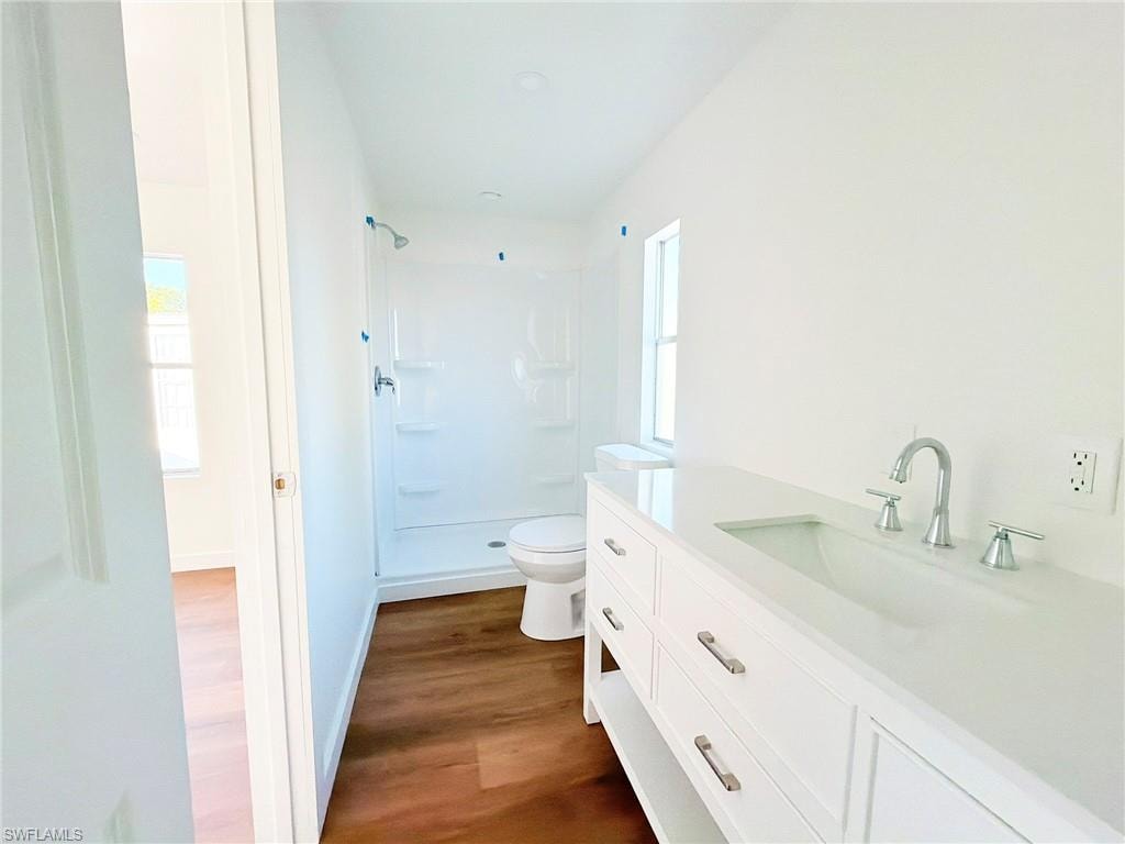 Fully remodeled with updated fixtures and contemporary design, the primary bath offers a clean, spa-like feel.