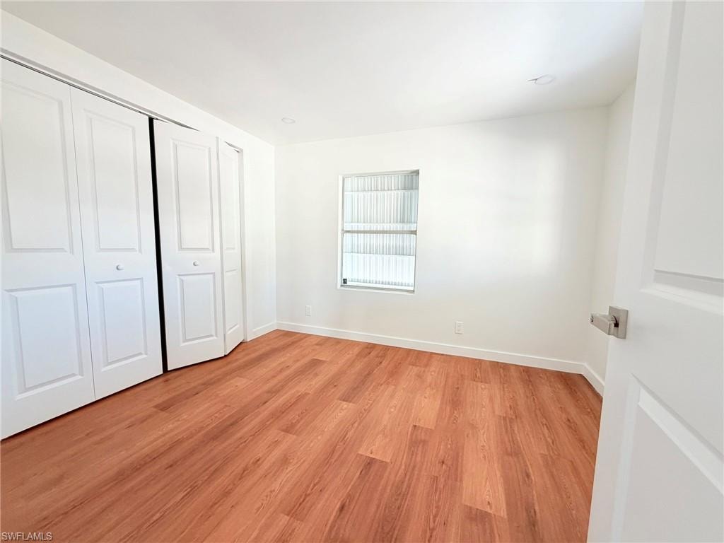 Comfortable and versatile, the secondary bedroom is perfect for guests, hobbies, or a home office.