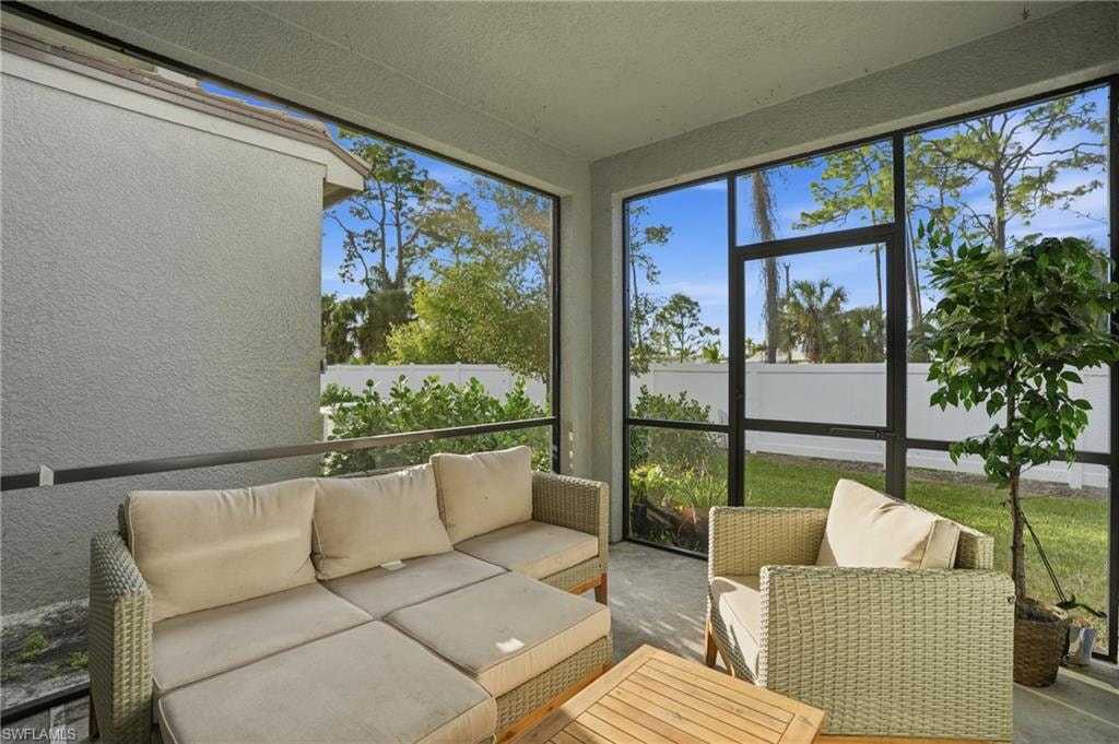 Sunroom with an outdoor hangout area