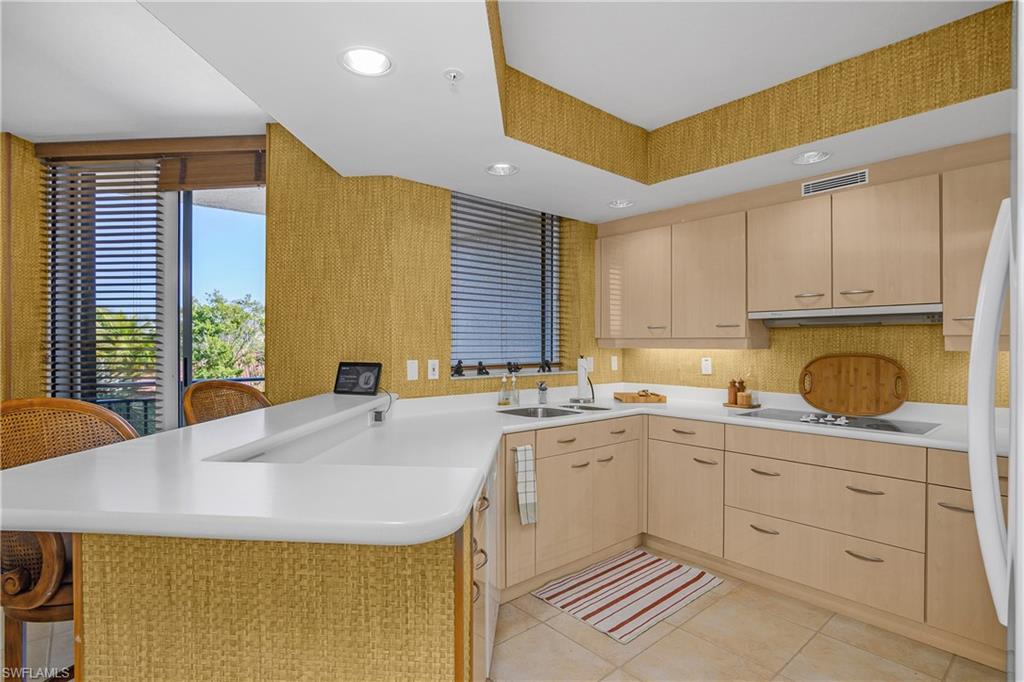 Kitchen adjacent to the den.