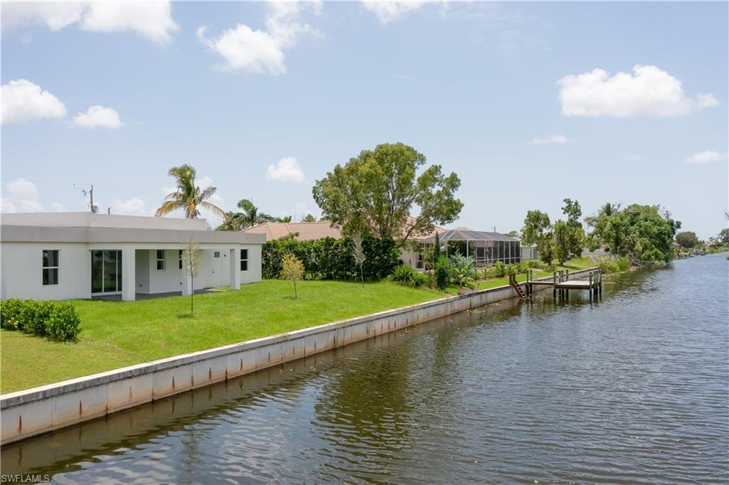 Water view with a dock