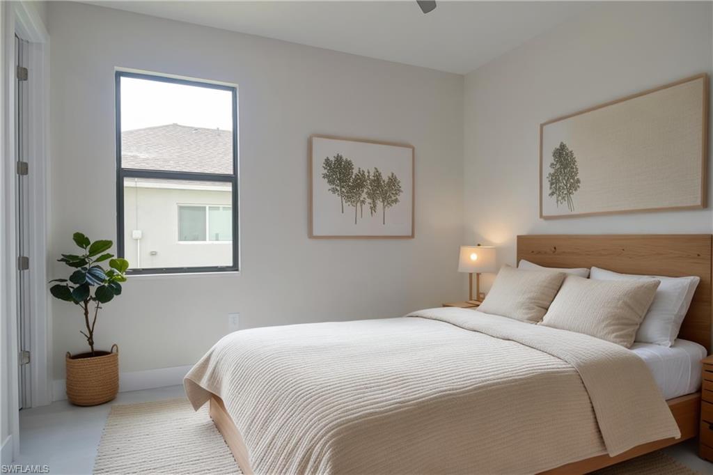 Bedroom with baseboards and ceiling fan