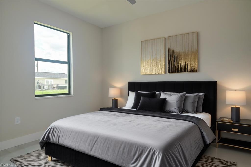 Bedroom with baseboards and ceiling fan