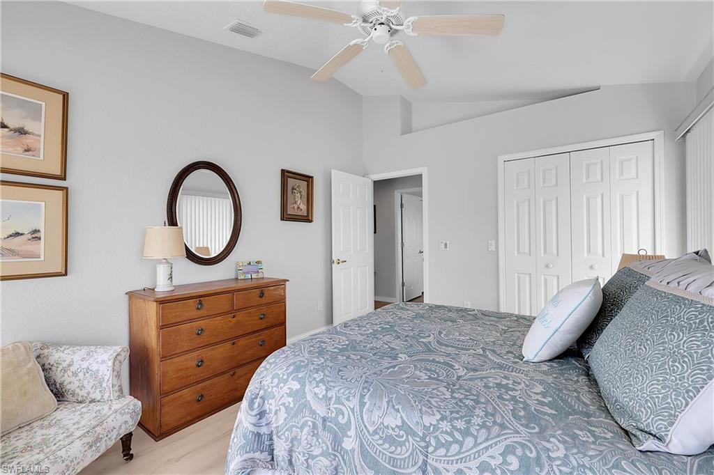4th bedroom, showing walk-in closet, vaulted ceiling with display shelf