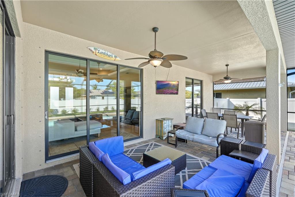 View of patio / terrace featuring outdoor lounge area and ceiling fan