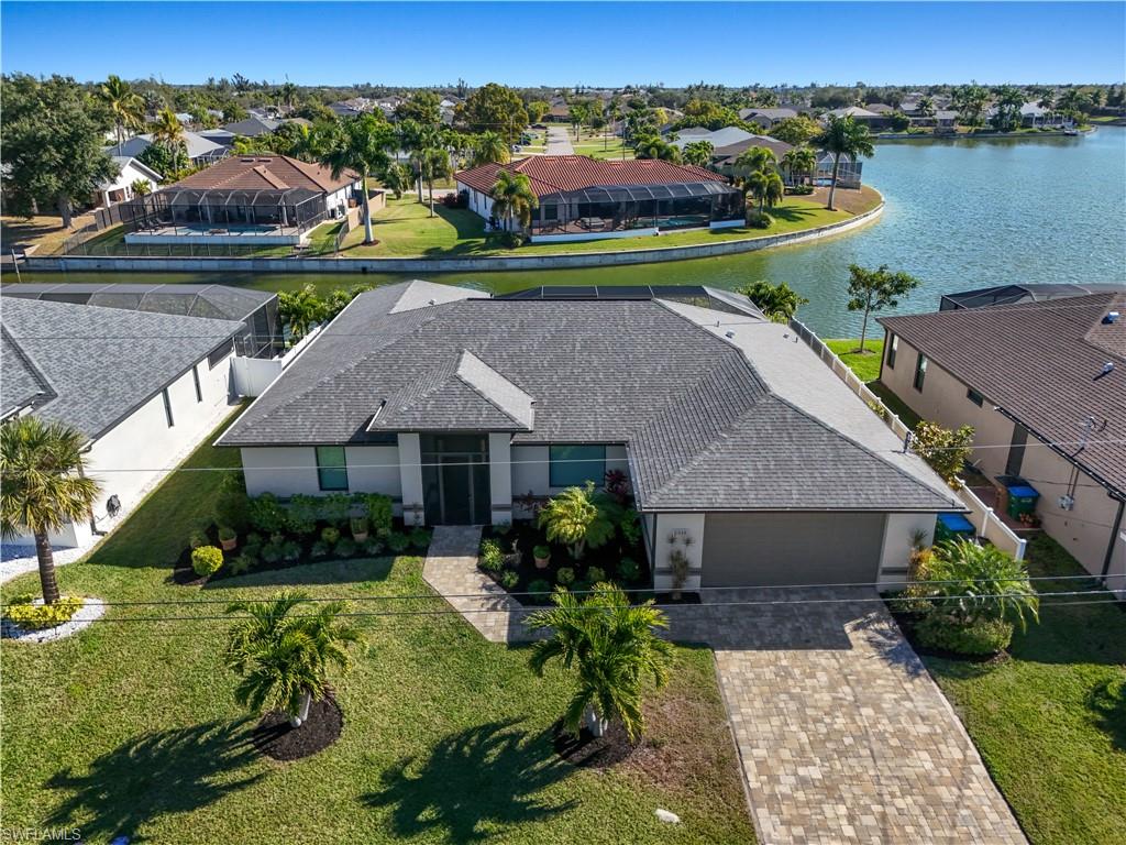 Aerial view of residential area with a nearby body of water