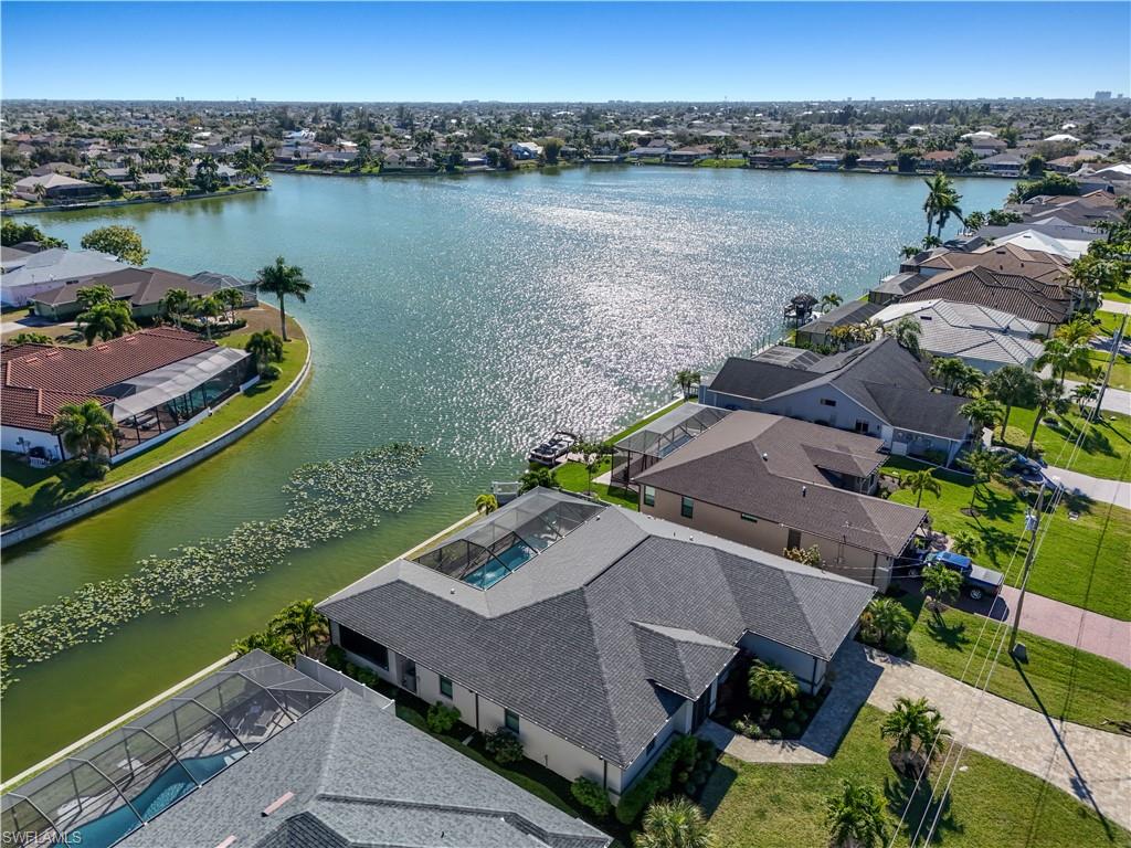 Aerial view of residential area with a large body of water