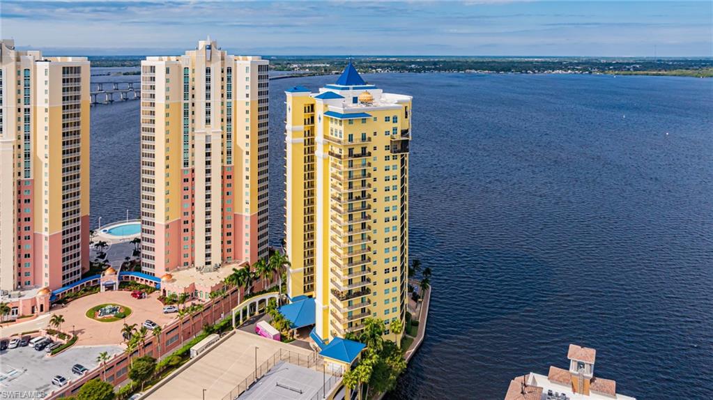 Aerial view of a large body of water and apartment complex