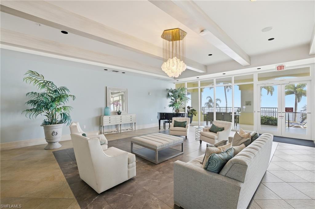 Common area featuring beamed ceiling