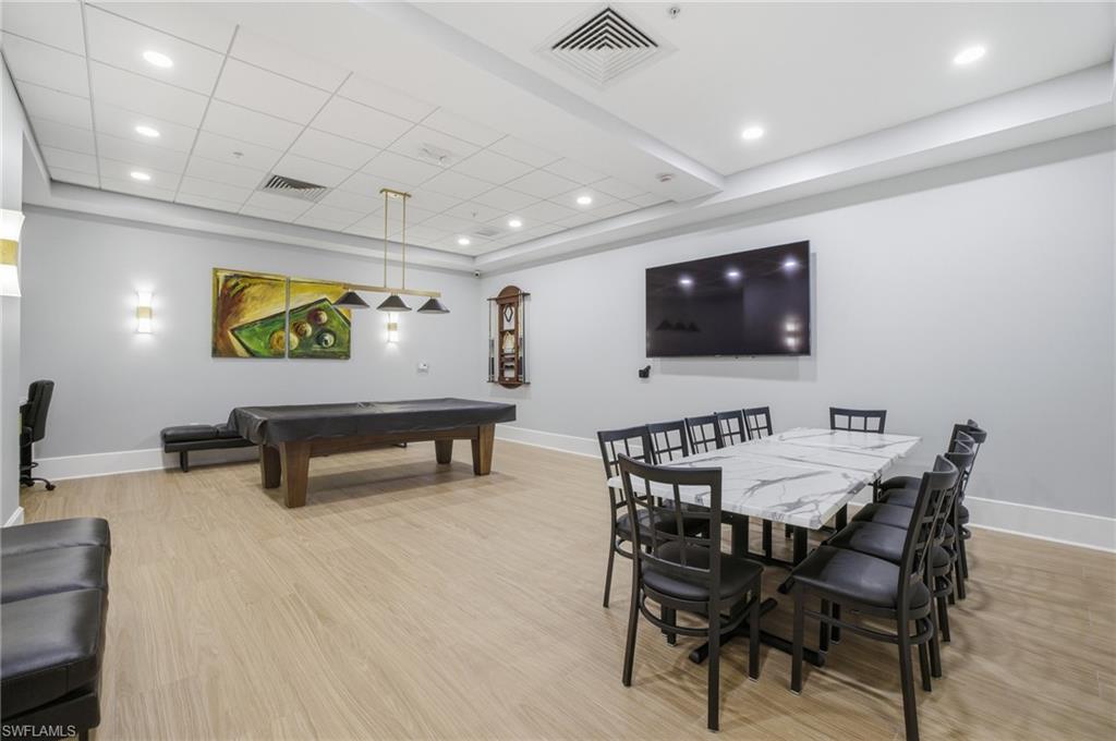 Recreation room featuring billiards and recessed lighting