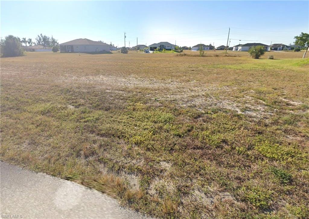View of yard featuring a residential view