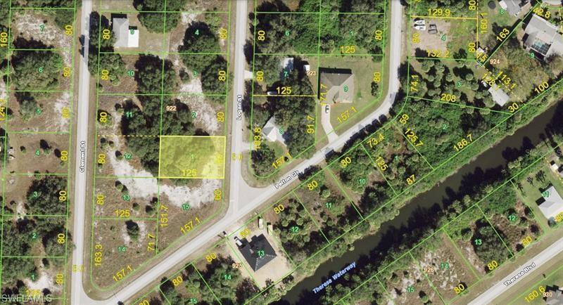 Aerial map of property and surrounding area featuring property boundaries highlighted
