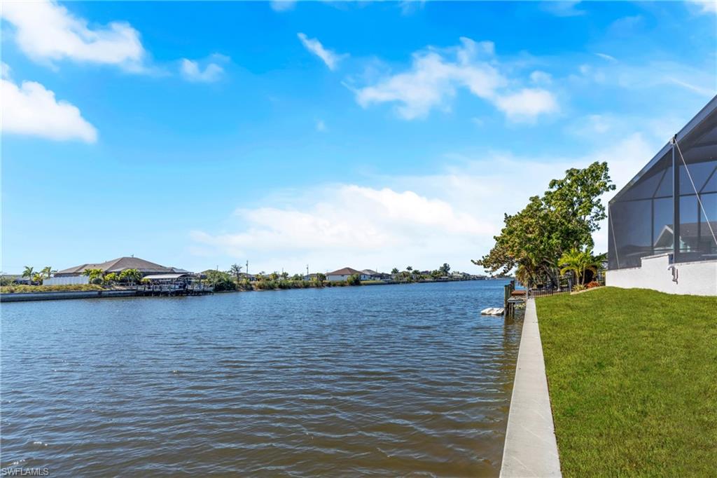 Water view featuring a dock
