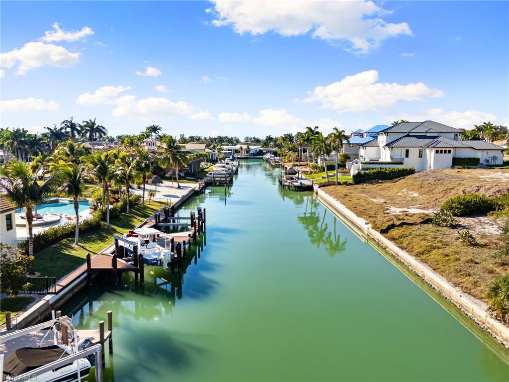 Water view with a dock and boat lift