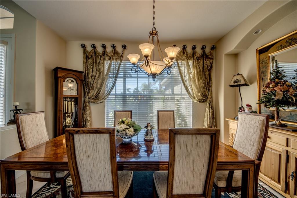 Dining room with hanging lights and plenty of natural light