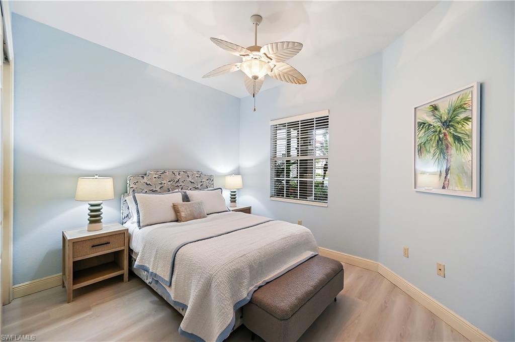 Bedroom with light wood-style flooring and ceiling fan