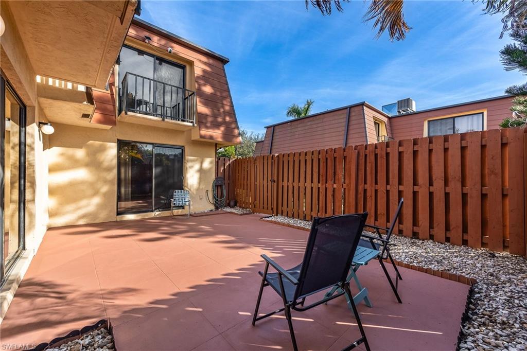 Patio / terrace with a patio and a fenced backyard