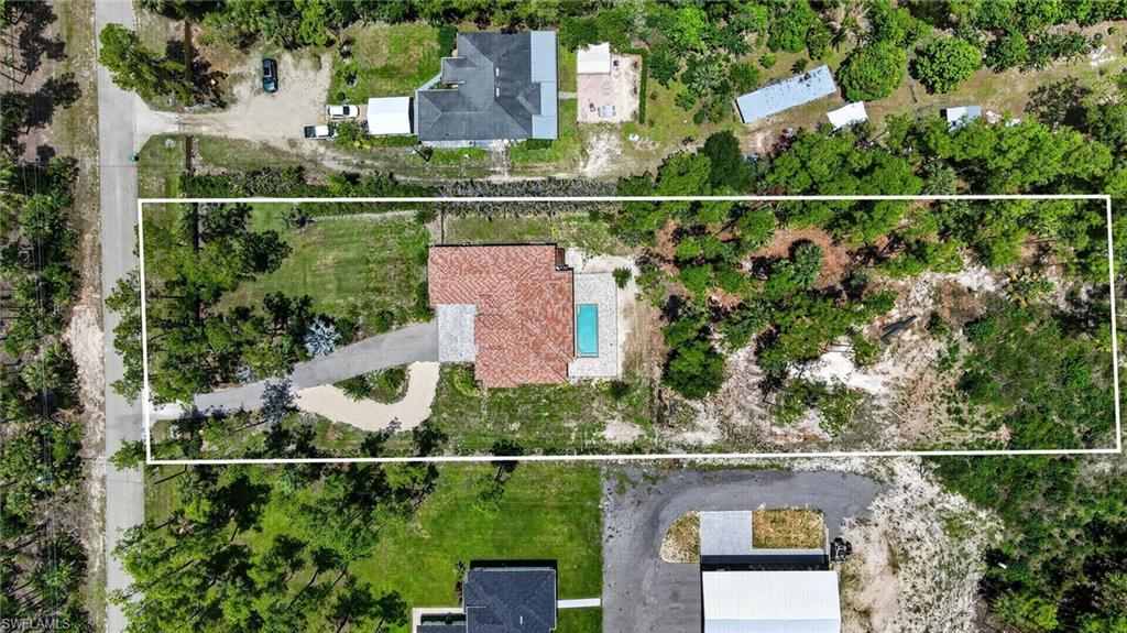 Aerial view of home and land