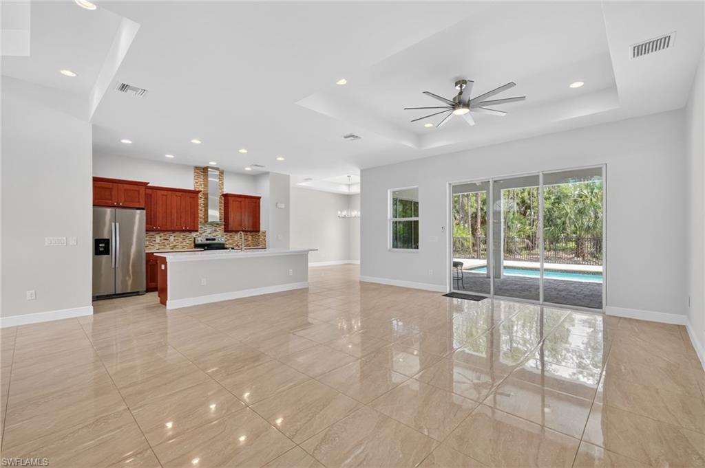 Great room, kitchen with beautiful view of backyard area