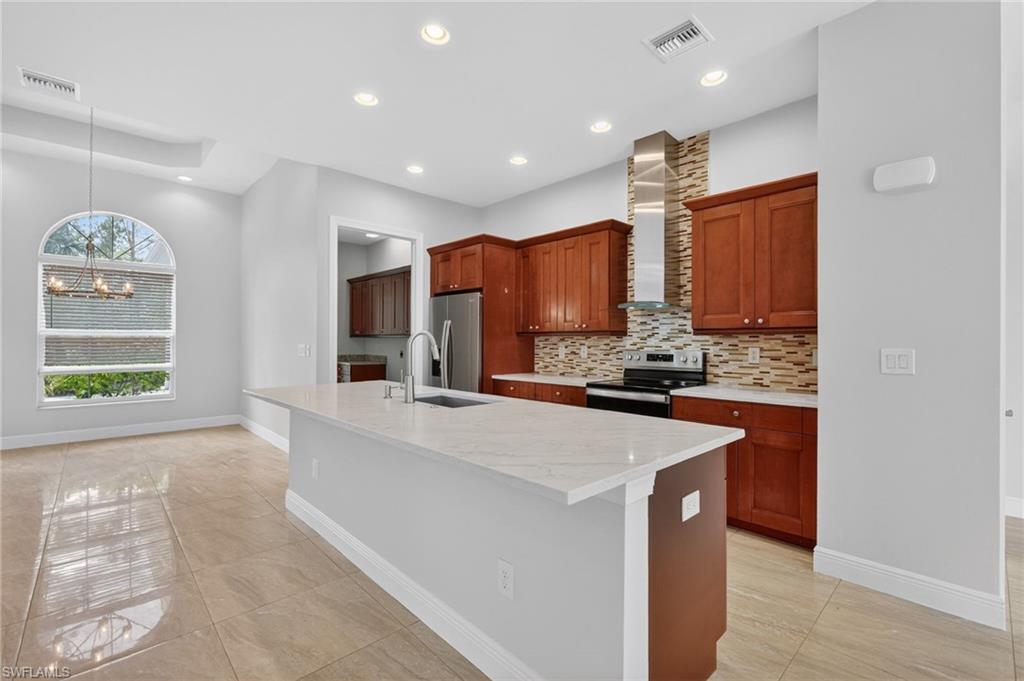 Beautiful solid wood soft close cabinetry, Quartz counters, new sink, range and dishwasher