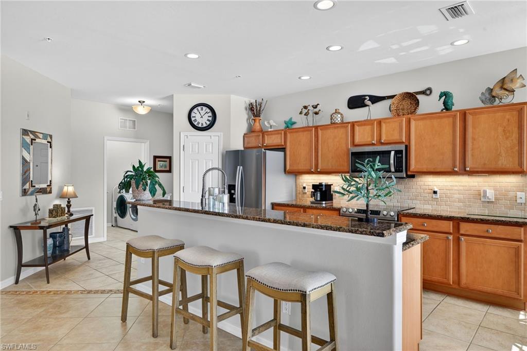 Thoughtfully designed kitchen to maximize cabinet and storage space.
