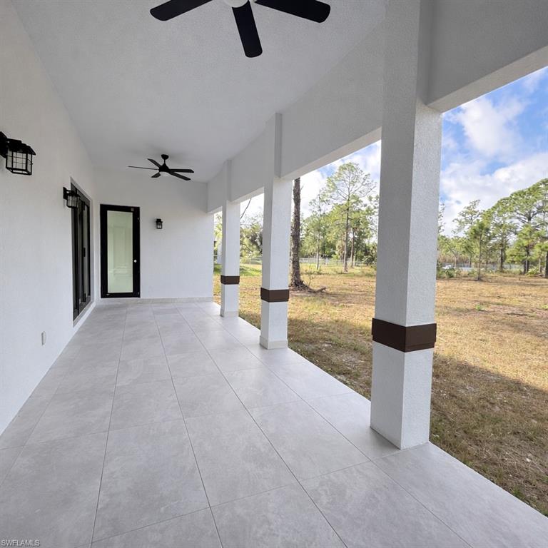 View of patio with a ceiling fan