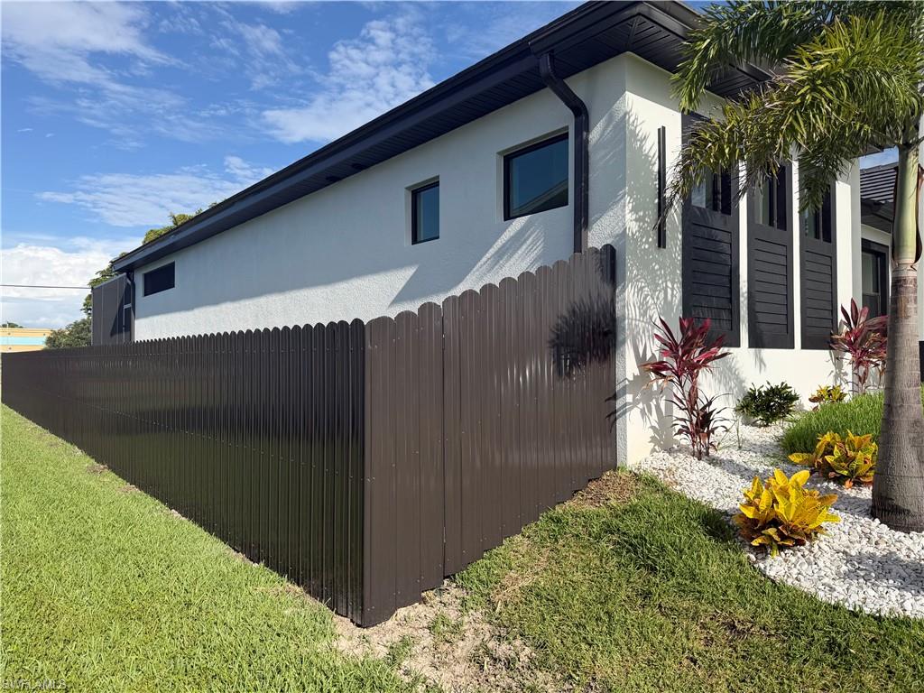 Full bronze color fenced yard