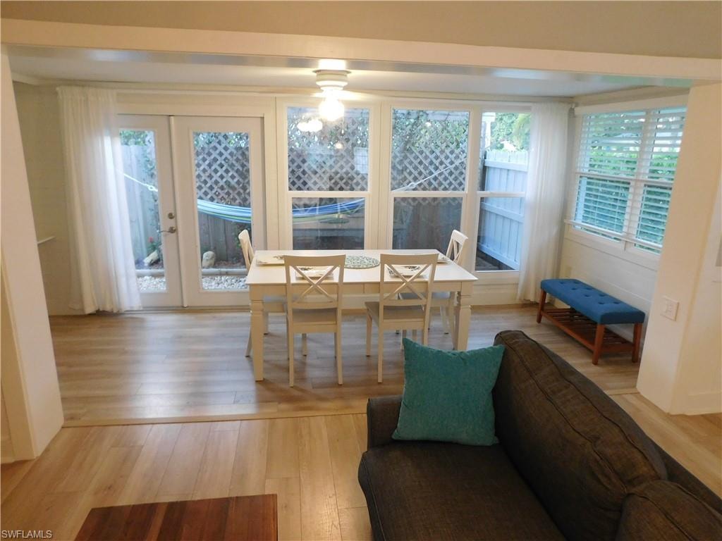 Dining room featuring plenty of natural light and hardwood / wood-style floors