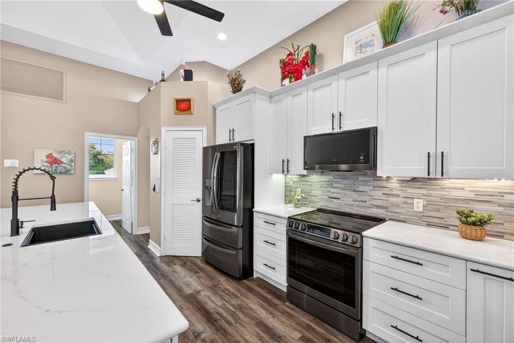 Cabinets and drawers are slow close. There is also a built in spice rack
