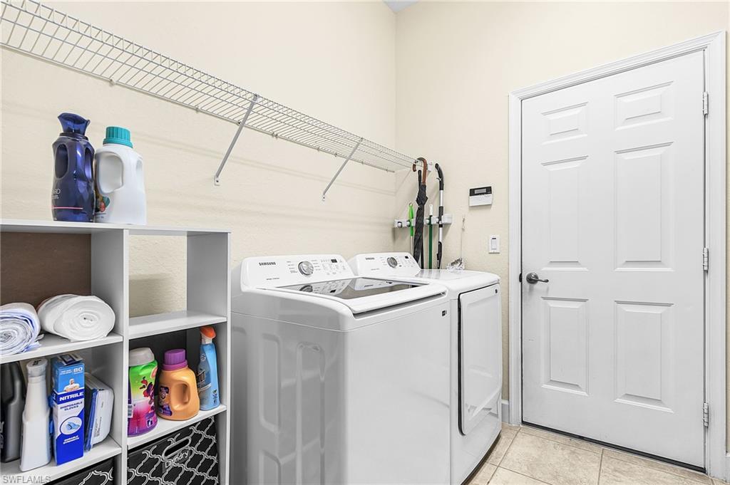 Laundery has shelves above for storage
