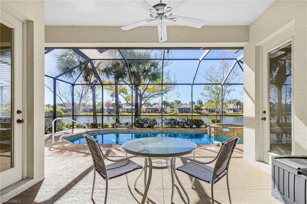 covered lanai overlooking pool and lake