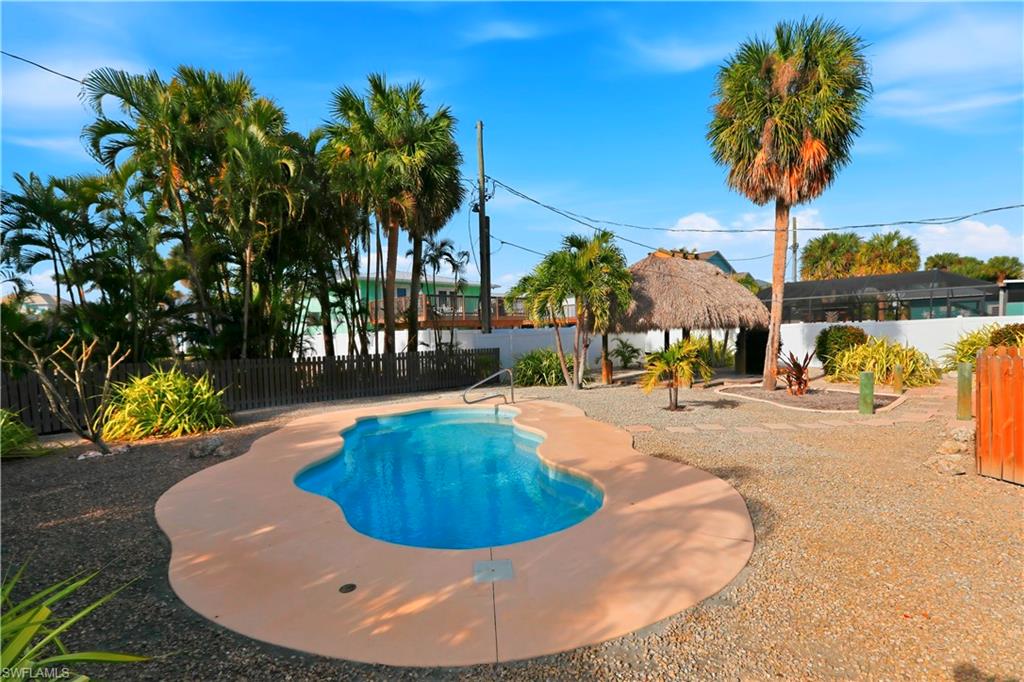 View of community featuring a gazebo and outdoor dining space