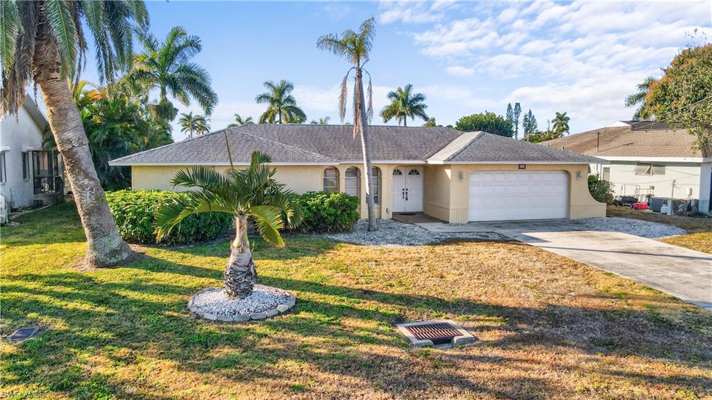 Areial view of the front of the home, direct access canal and close proximity to the Caloosahatchee River.
