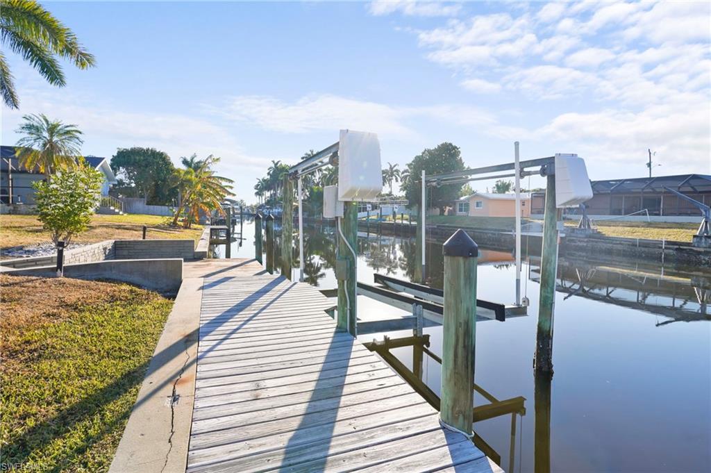 Spacious attached two-car garage with side door entrance. Home comes with sporting equipment, including Kayaks and bikes.