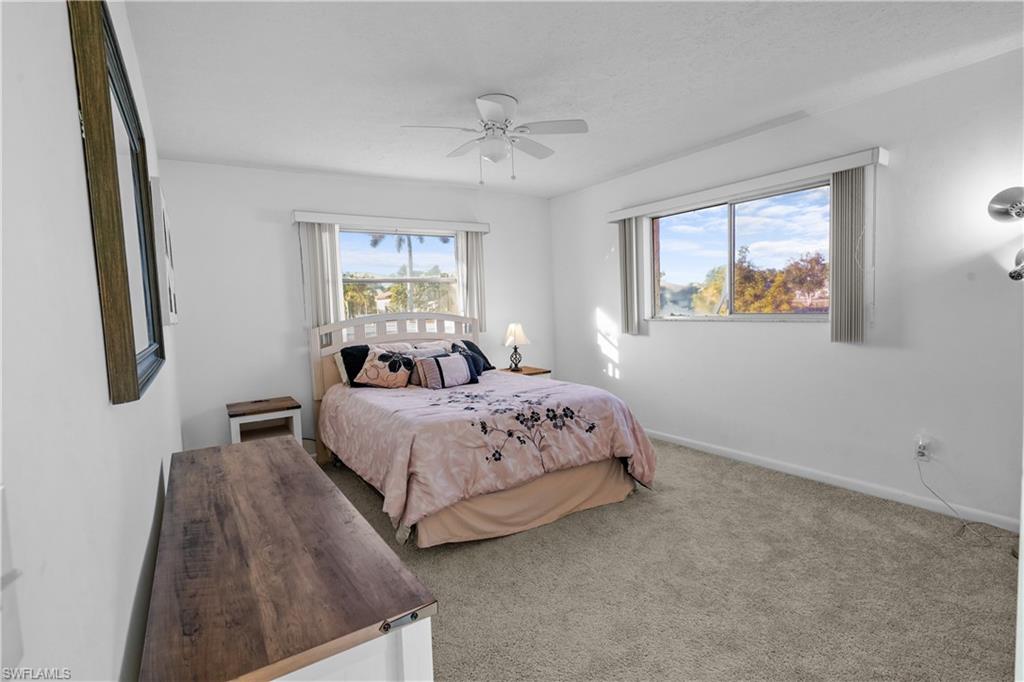 Guest wing / pool access full bathroom with bath / shower combo with glass door..
