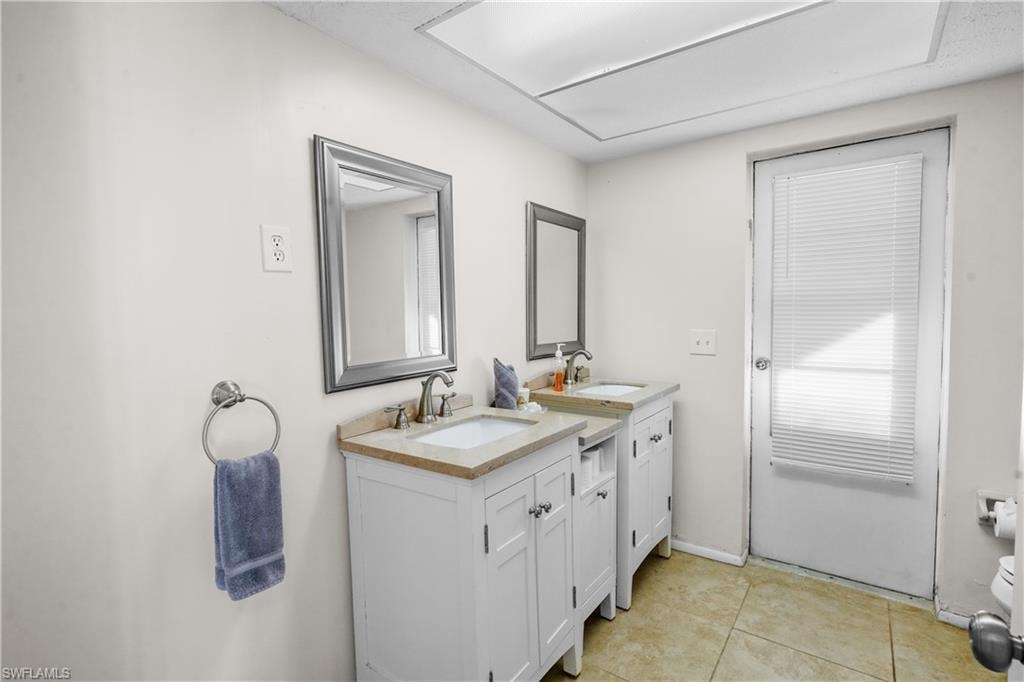 Laundry room with cabinet space, washer and clothes dryer. Large owners storage cabinets have locks.