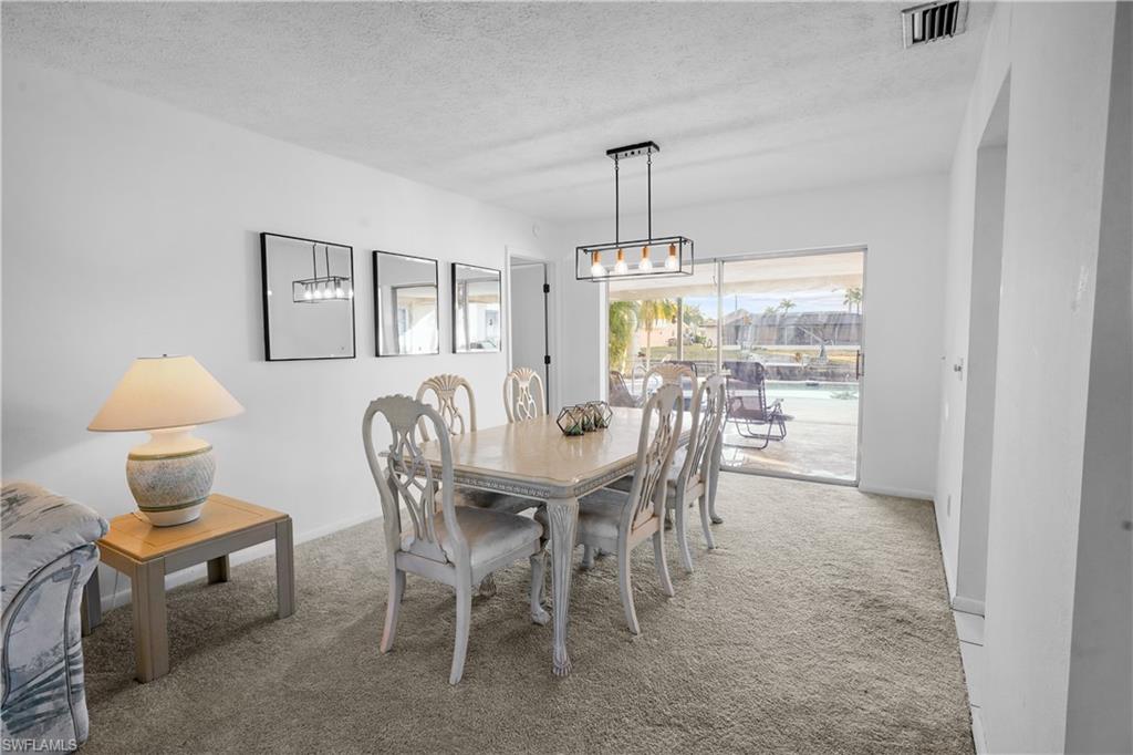 Double door entry opens to the foyer and living room has wonderful natural lighting.