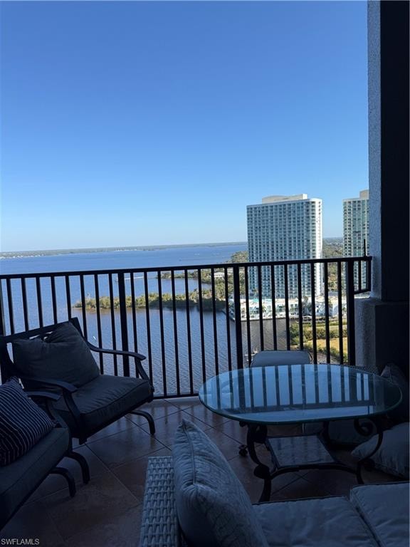 Balcony featuring a water view