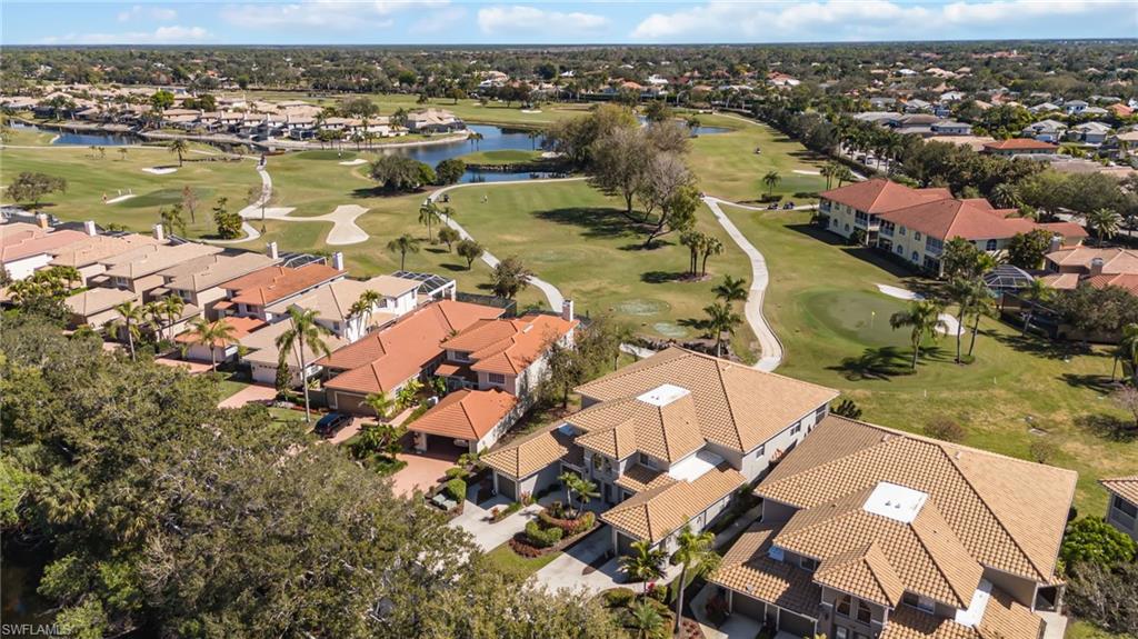 View of property location featuring a nearby body of water and nearby suburban area