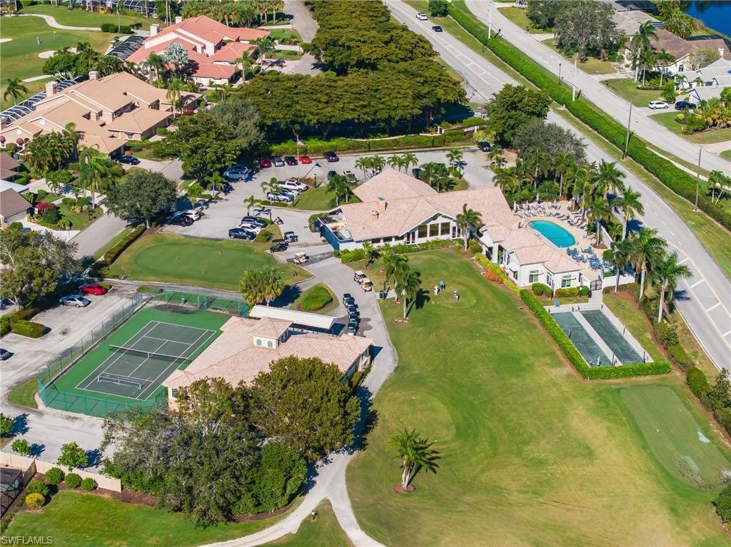Aerial view of residential area with a golf club