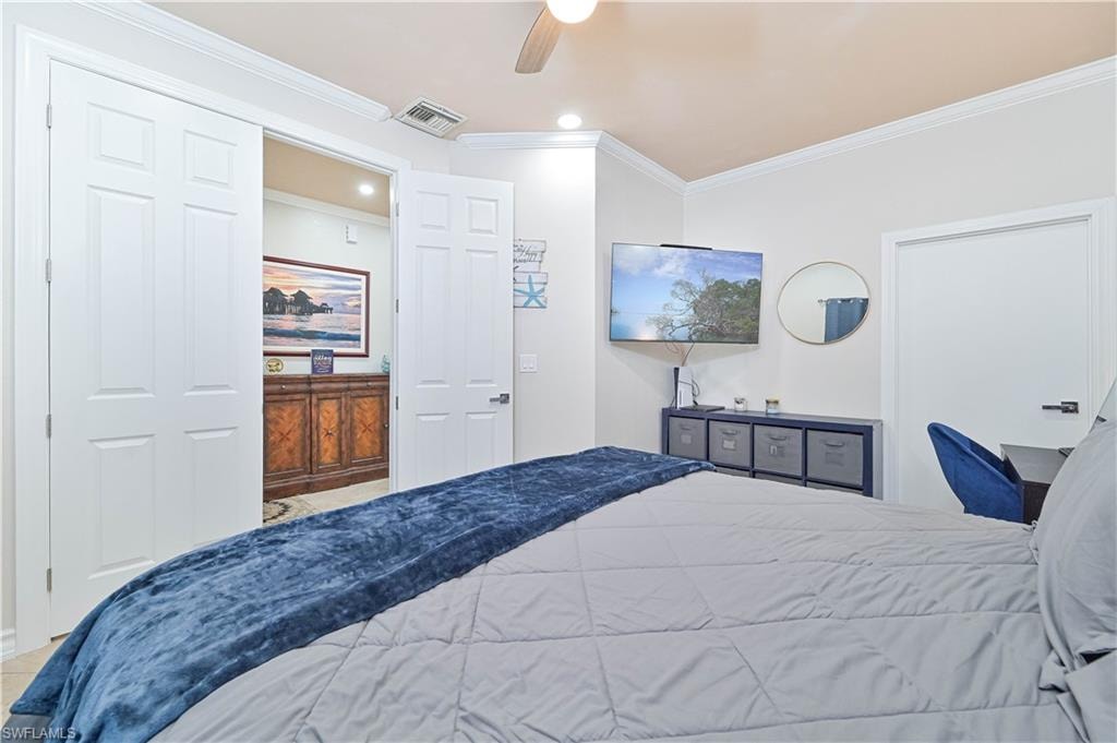 Bedroom featuring ornamental molding, ceiling fan, and recessed lighting