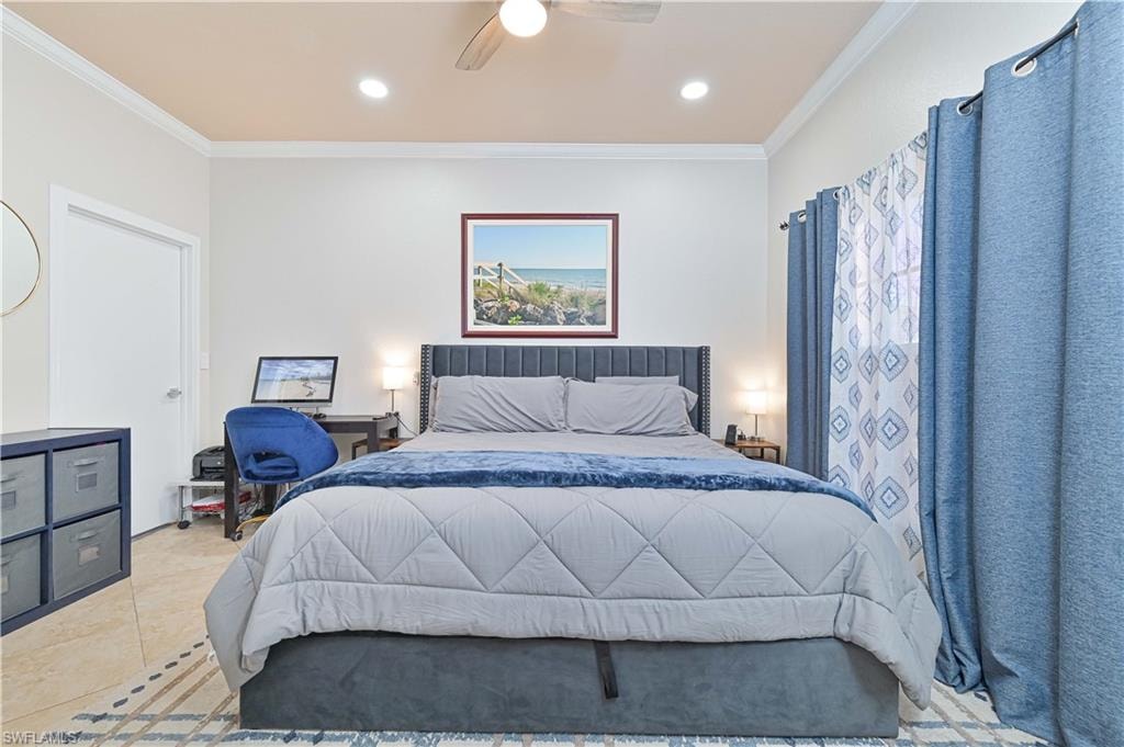 Tiled bedroom with crown molding, a ceiling fan, and recessed lighting