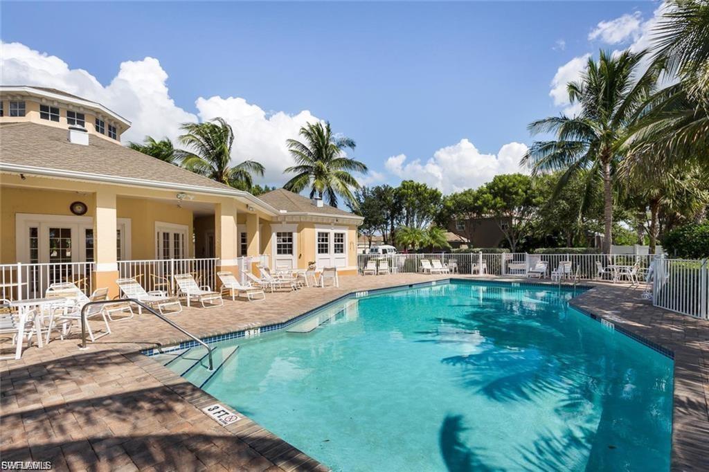 Community pool featuring a patio and french doors