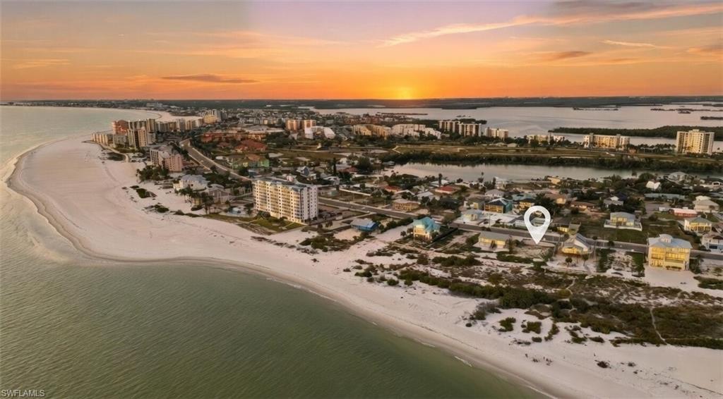 View of urban area with expansive beach
