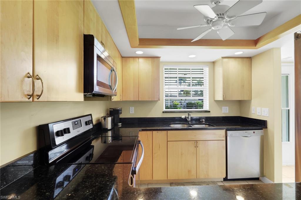 Updated kitchen with stainless appliances and ample counter space