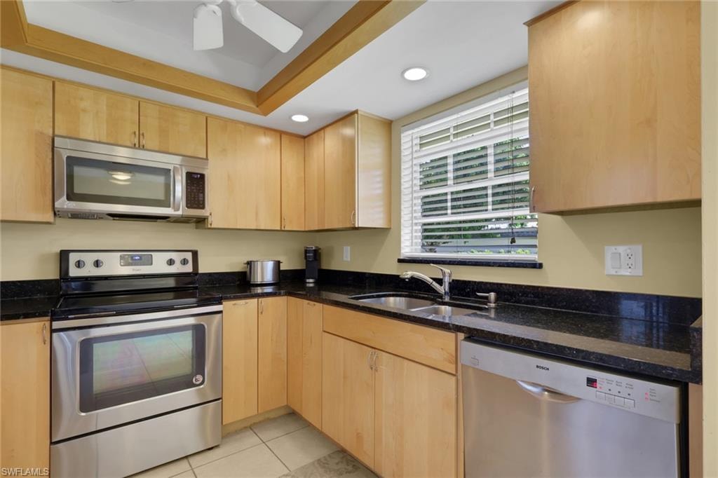 Updated kitchen with stainless appliances and ample counter space