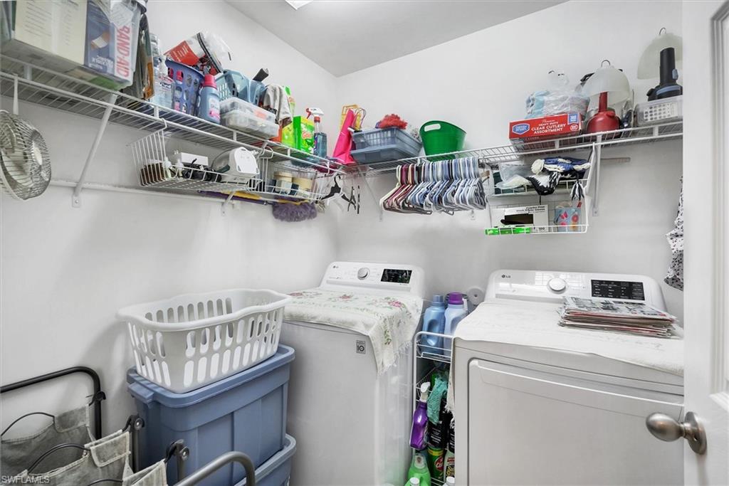 Laundry room featuring washing machine and dryer