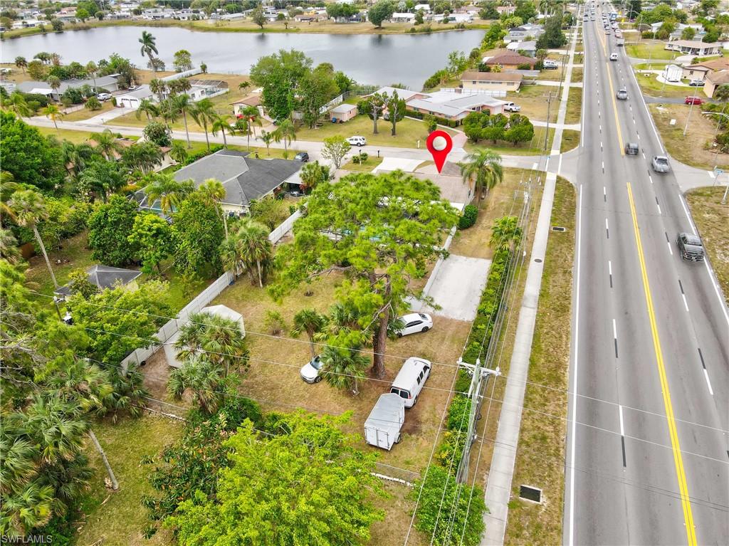 Aerial view of residential area with a large body of water